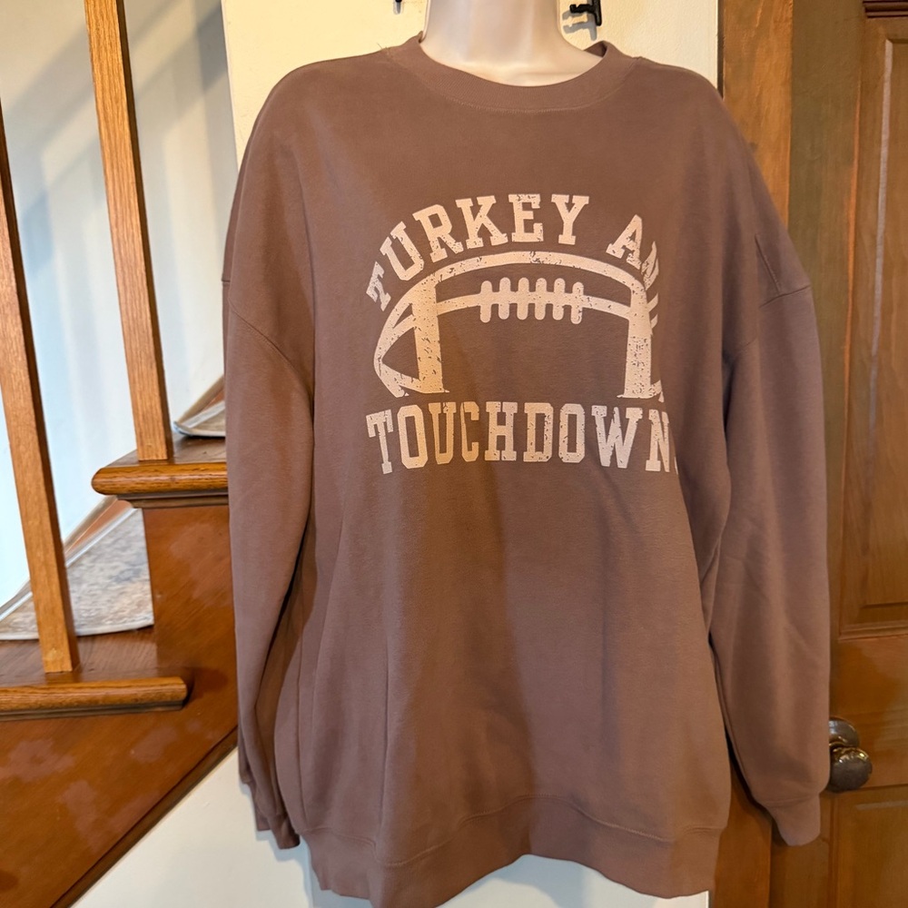 Pink Lily NWOT “Turkey and Touchdowns” graphic holiday sweatshirt . Size M .Tan
